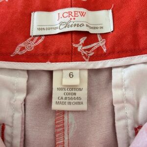 J Crew broken-in chino cotton shorts in an orange nautical anchor print